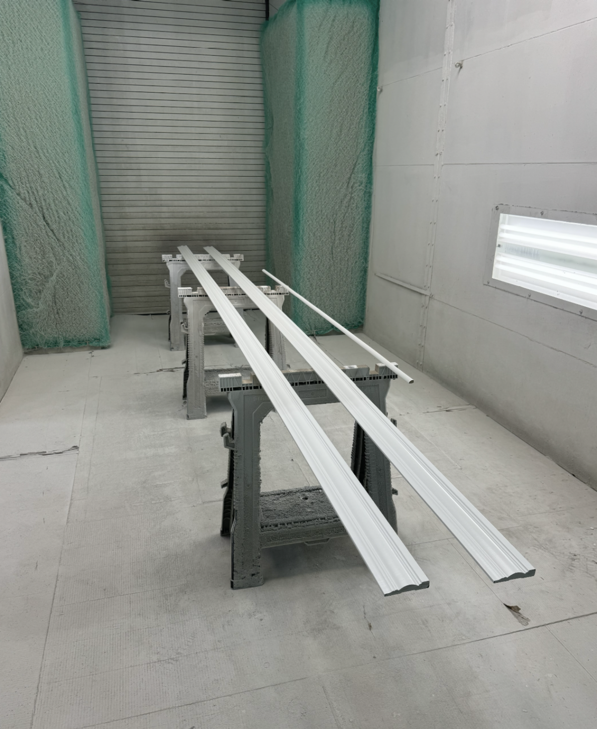 A room with a lot of white pieces on a table