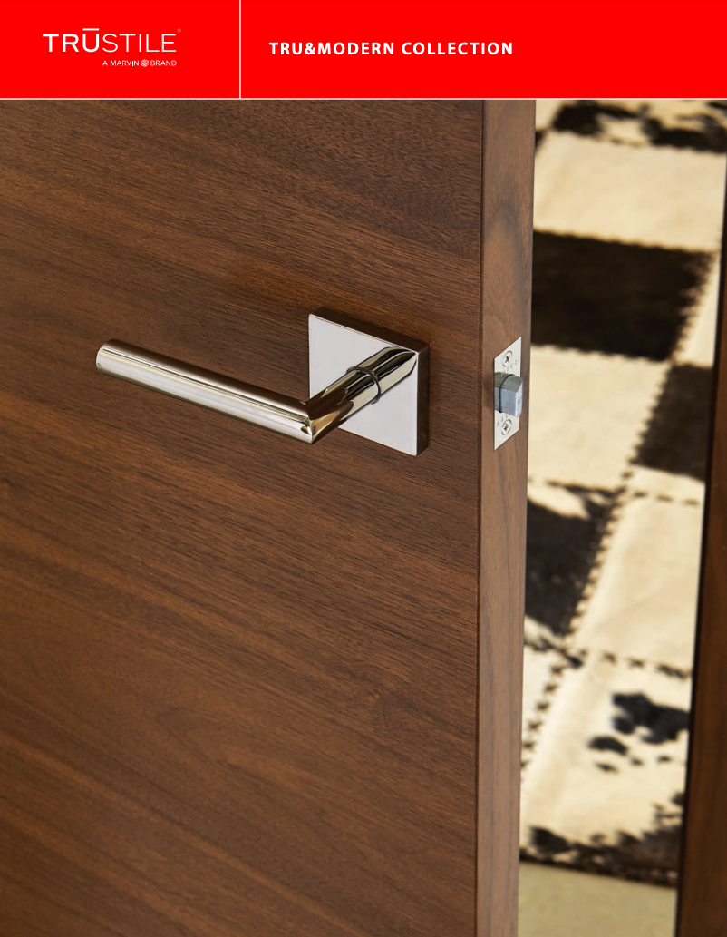 A close up of a door with a chrome handle