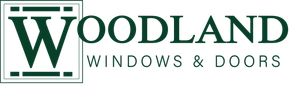 The logo for woodland windows and doors is green and white.