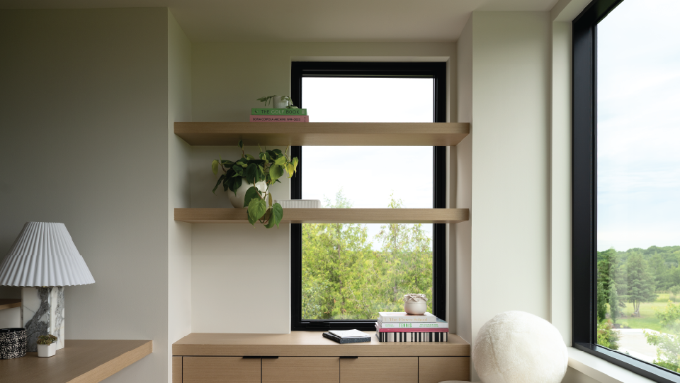 A living room filled with furniture and a fireplace.