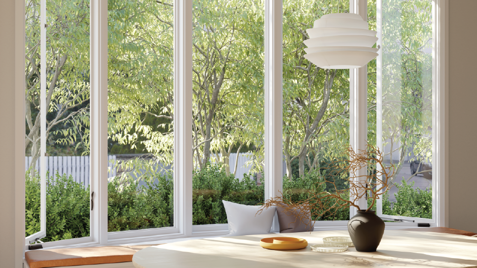 A kitchen with a large island and wooden beams on the ceiling