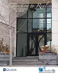 A building with a lot of windows and a sign that says from inspiration to reality