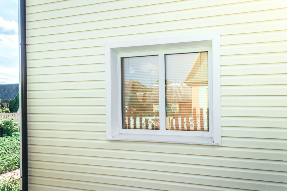 Siding and windows of a house.