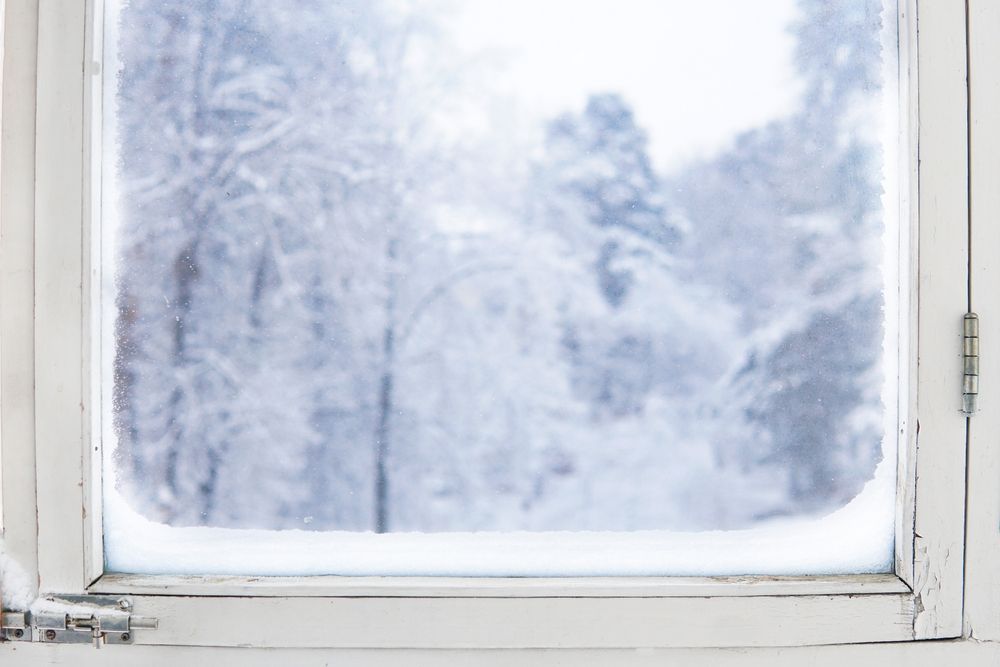 Replacing a window in the winter.