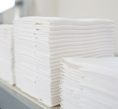 Folded White Fabrics — Buderim Laundrette in Buderim, QLD