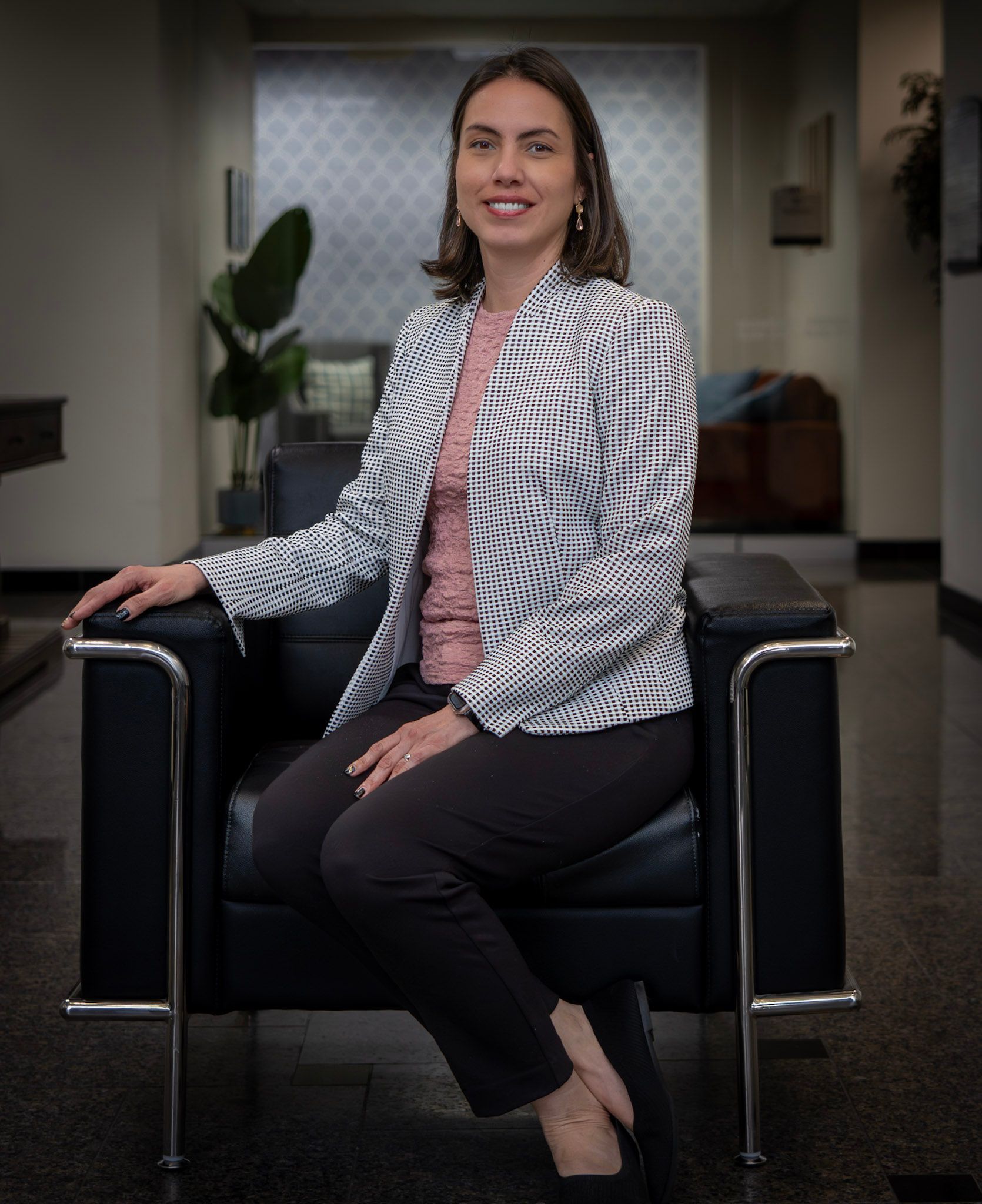 A close up of a white wall with a brush stroke pattern.