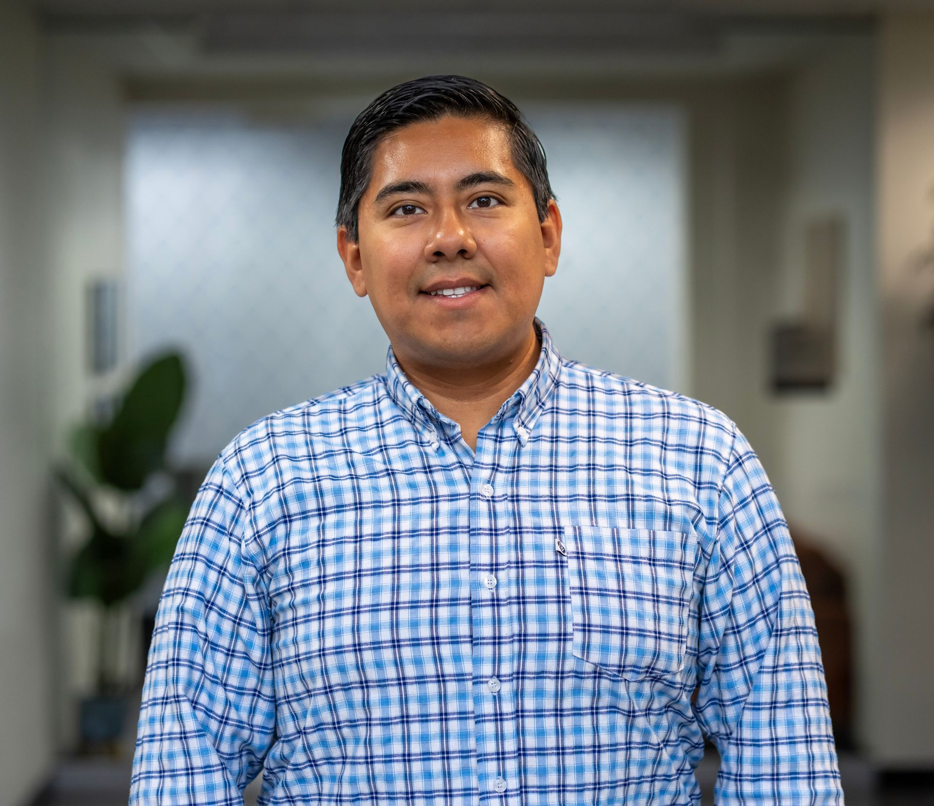 A close up of a white wall with a brush stroke pattern.