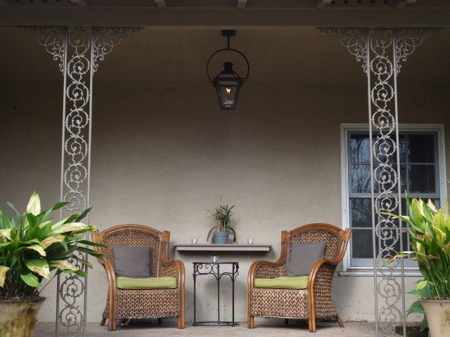 Beautiful Iron Columns with Two Chairs
