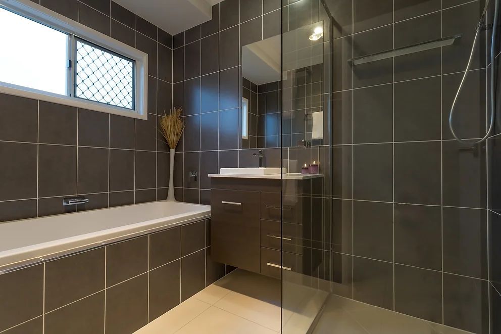 Black Tilesin Modern Bathroom — Engineering And Drafting Services In Yeppoon, QLD