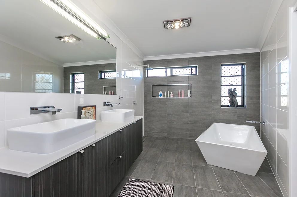 Bathroom With Bathtub and Two Sinks  — Engineering And Drafting Services In Yeppoon, QLD