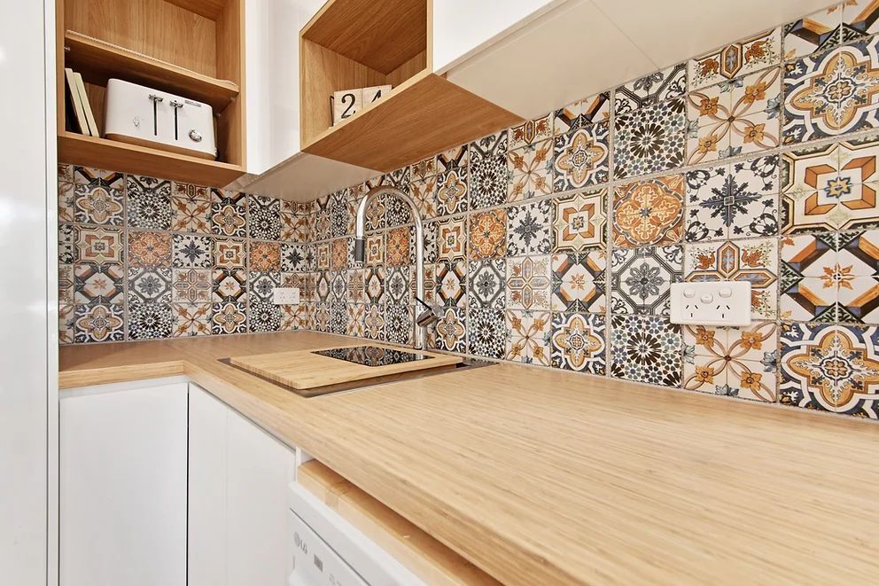 Kitchen With Sink and Decorative Tiles — Engineering And Drafting Services In Yeppoon, QLD