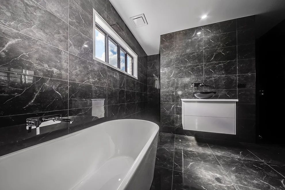 Black Bathroom With White Bathtub And Sink — Engineering And Drafting Services In Yeppoon, QLD