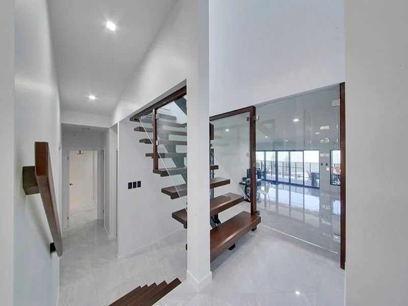 New Build White House With Wooden Stairs — Engineering And Drafting Services In Yeppoon, QLD
