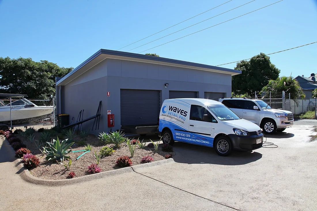 Storage Shed Behind The Two Cars — Engineering And Drafting Services In Yeppoon, QLD