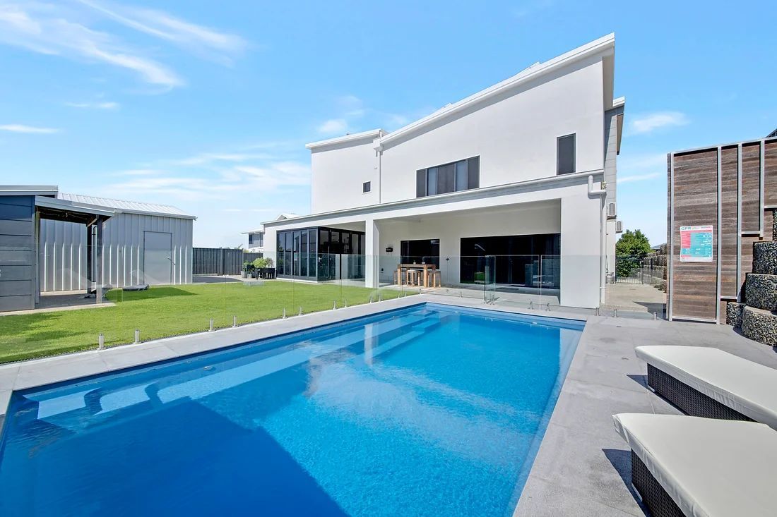 Large Swimming Pool From The House — Engineering And Drafting Services In Yeppoon, QLD