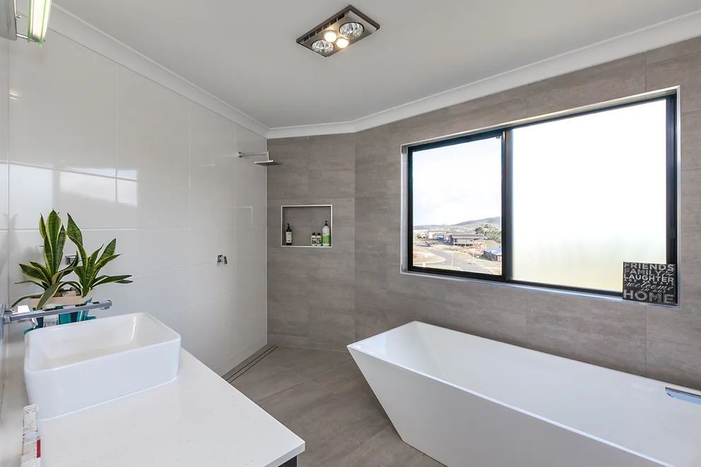 Modern Ceramic Bathub in New Build Bathroom  — Engineering And Drafting Services In Yeppoon, QLD