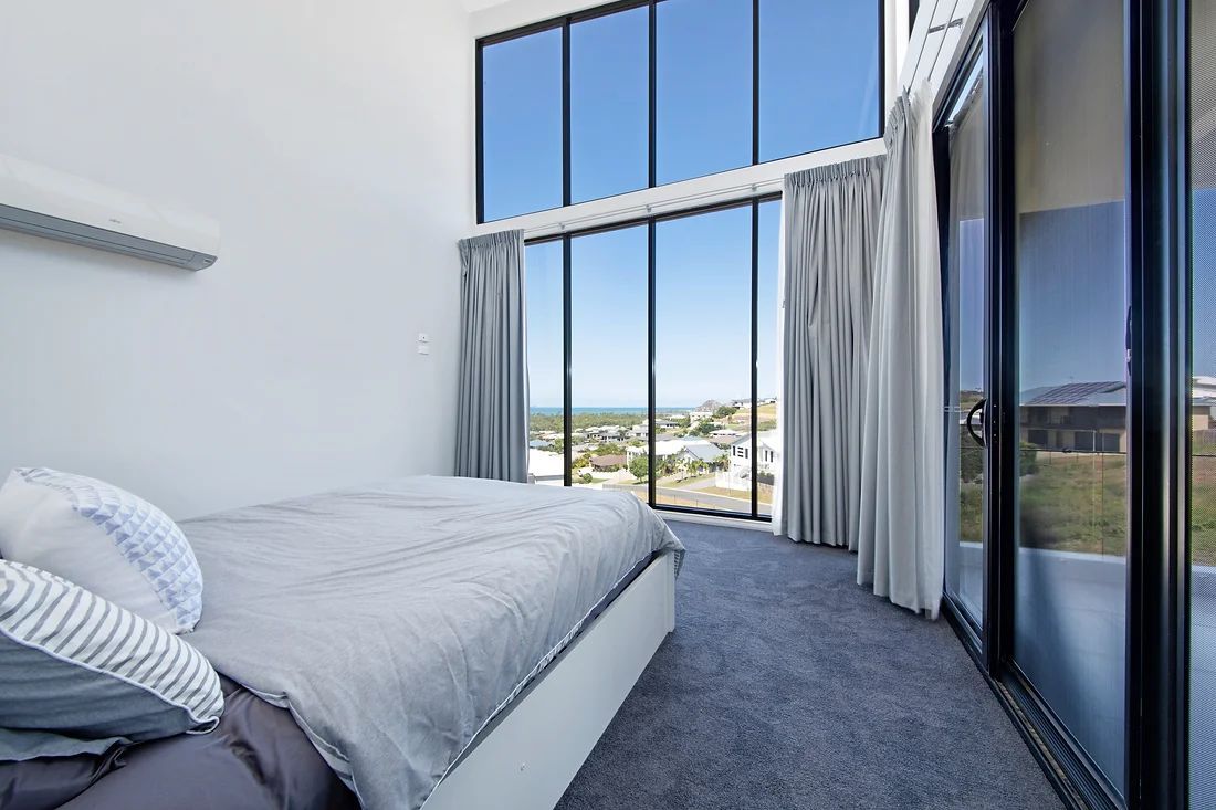 Modern Bedroom With Beautiful View From The Window — Engineering And Drafting Services In Yeppoon, QLD