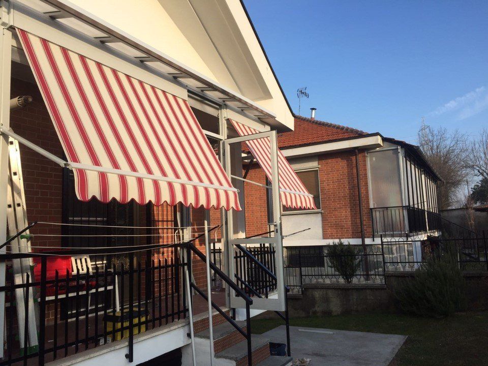 tende da sole per negozio