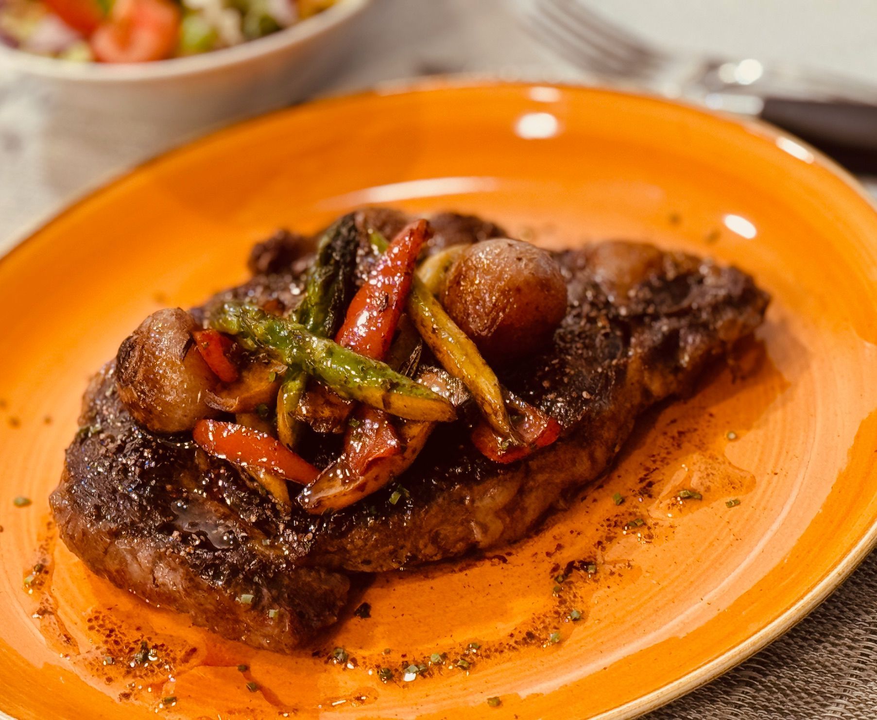 Hertzog's ribeye with asparagus and roasted shallots- a local Missouri beef producer 