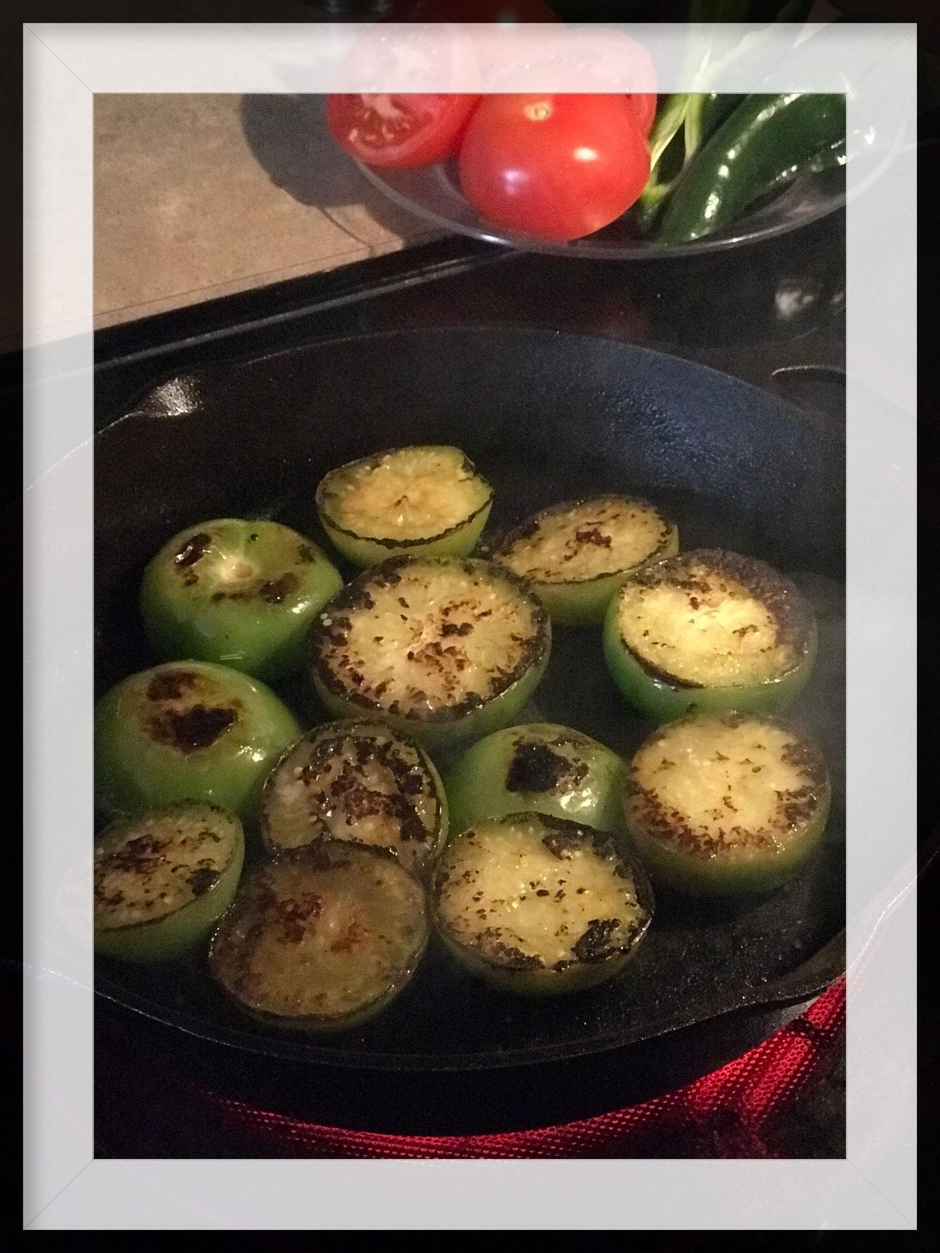 Char the tomatillos in a cast iron pan
