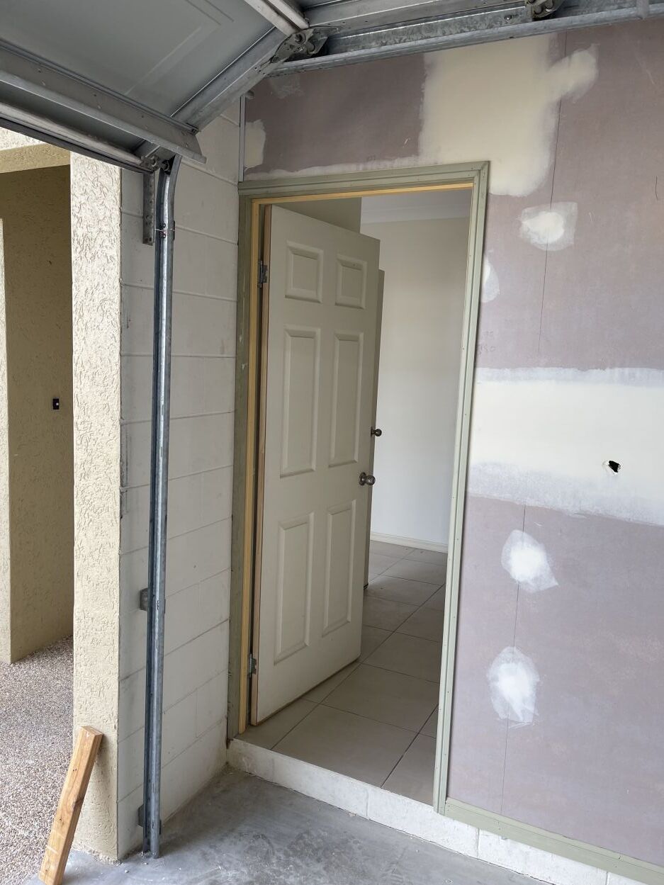 finishing off new plasterboards in Townsville