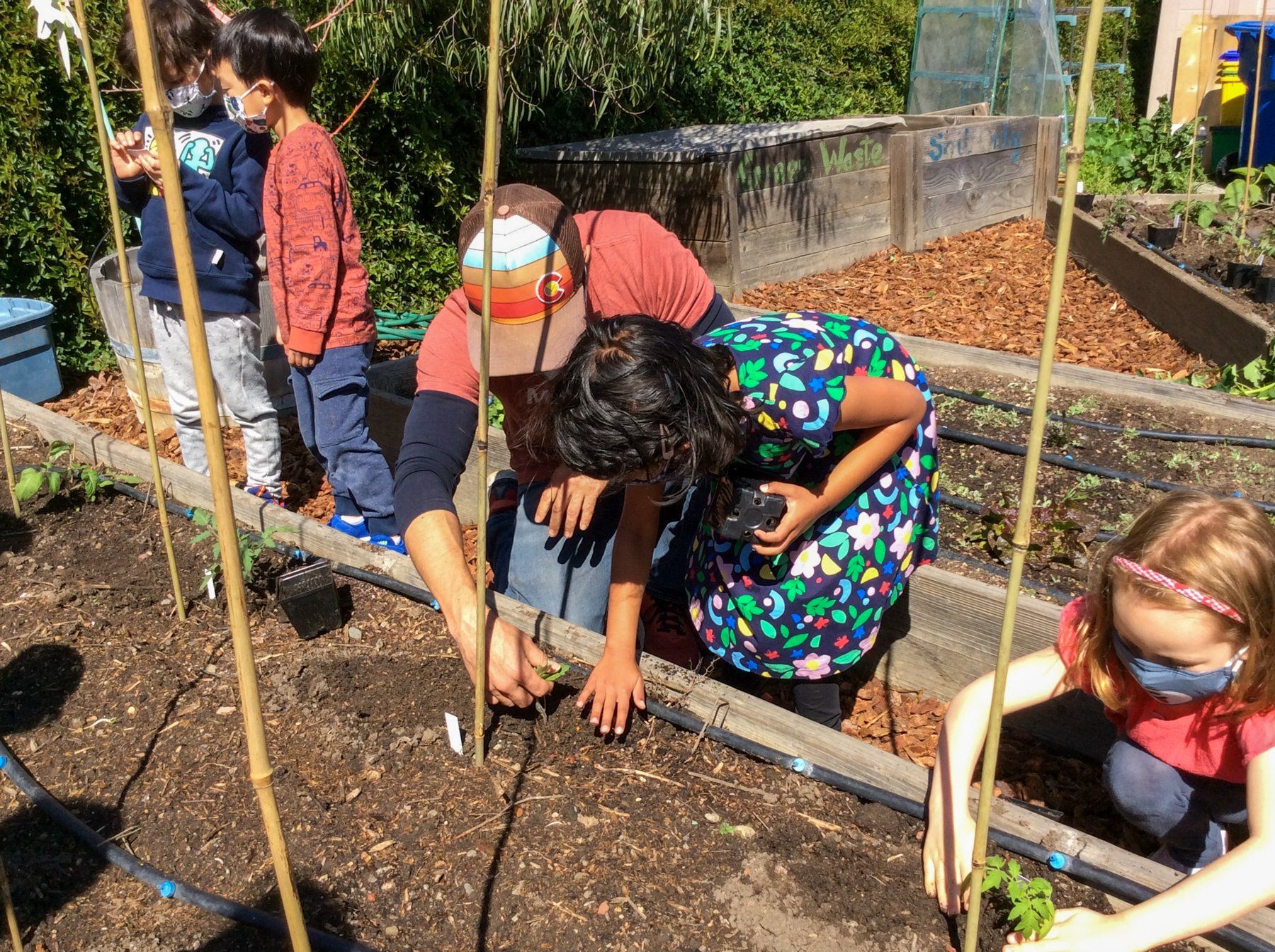 Primary students working on Casa di Mir’s lower campus garden