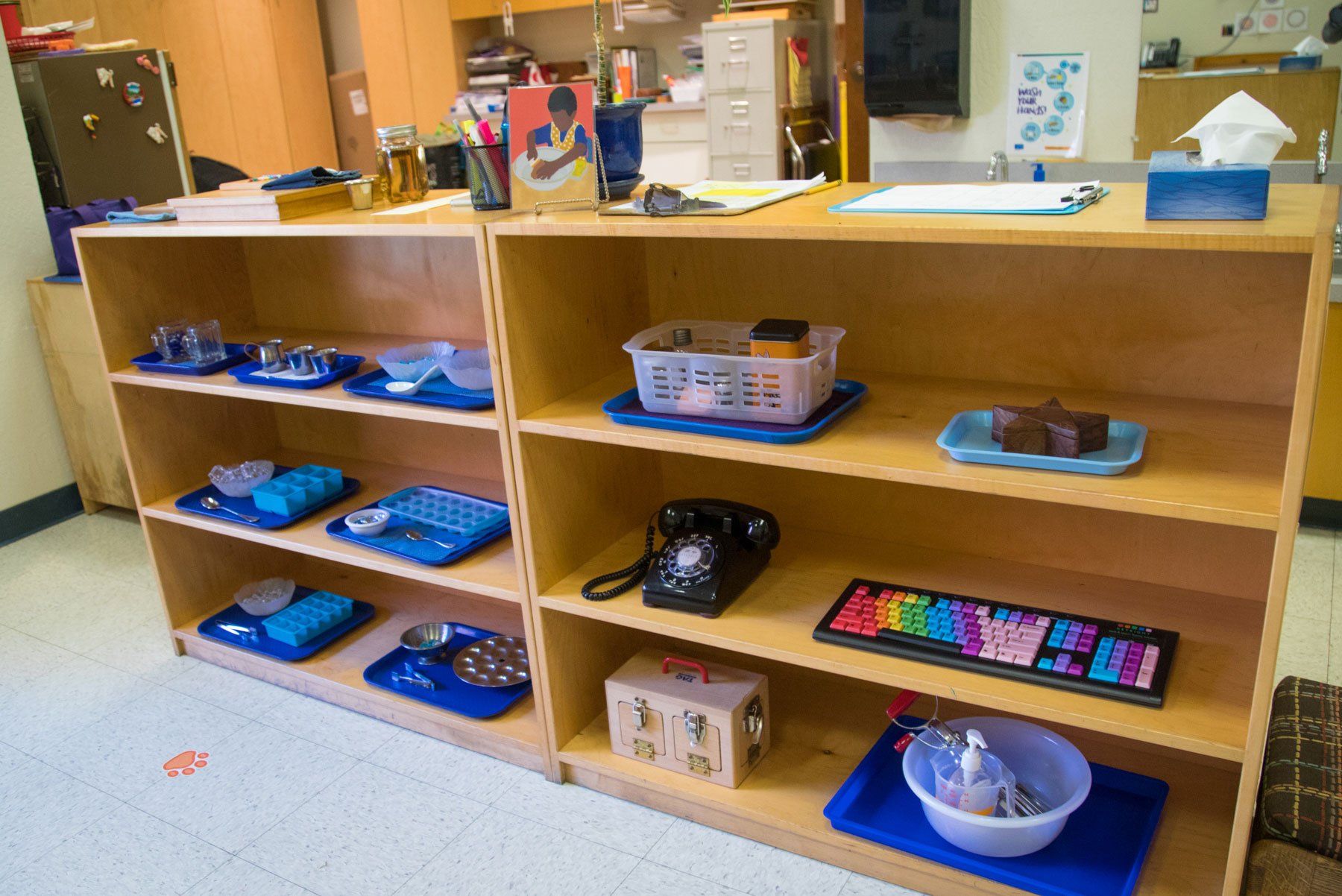 Classroom shelf with Montessori materials