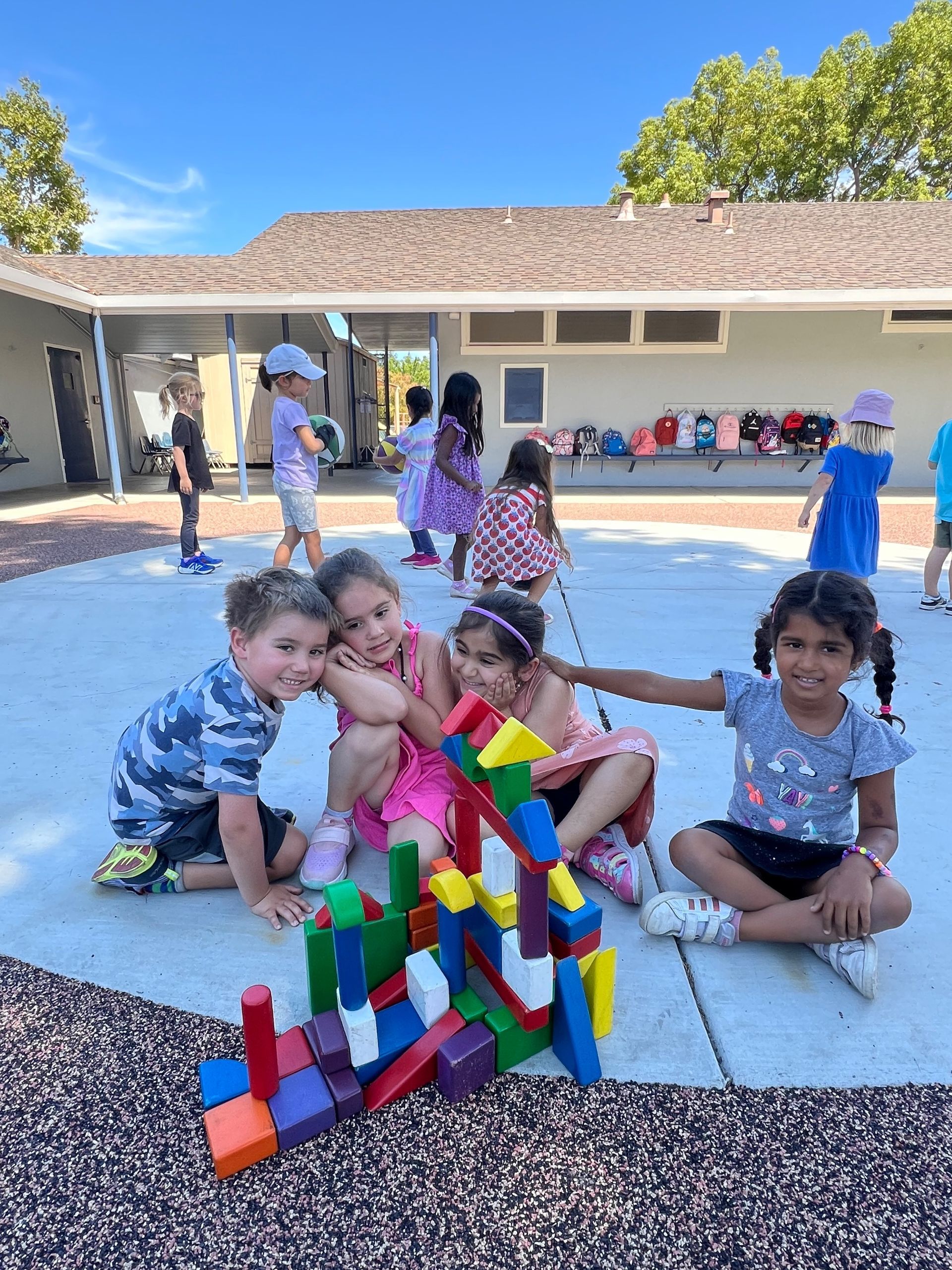 Montessori childrens working outdoors