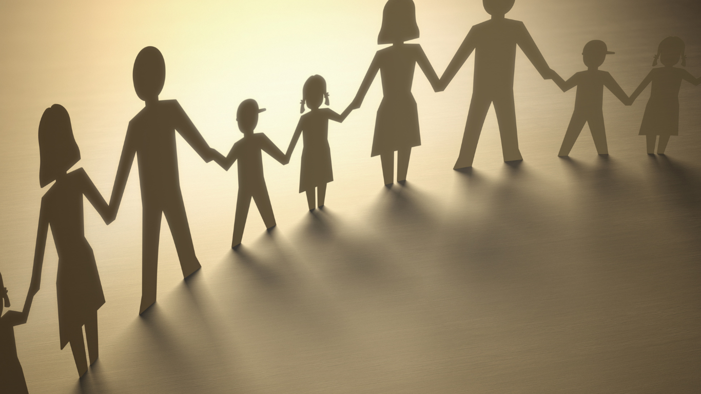 A paper cut out of a family holding hands