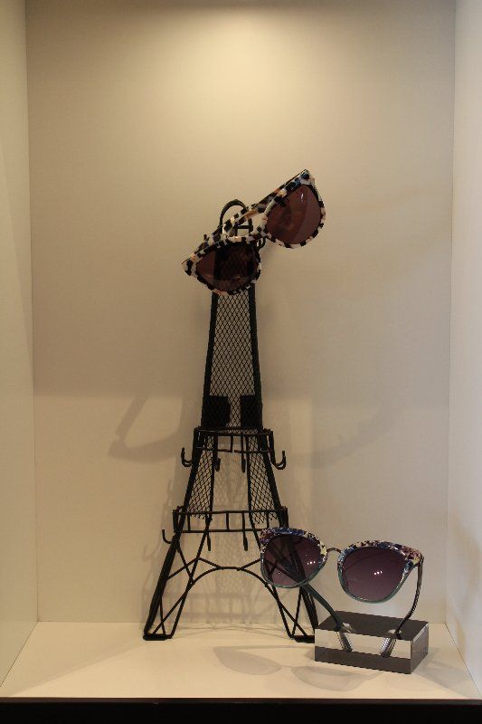 European Eyewear — Sunglasses on Top and Beside of the Miniature Eiffel Tower in Belleair Bluffs, FL