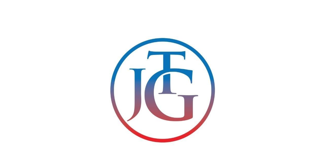 A logo with the letter t and g in a circle on a white background.