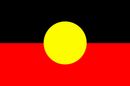 Australian Aboriginal Flag: Black top, red bottom, yellow center circle.