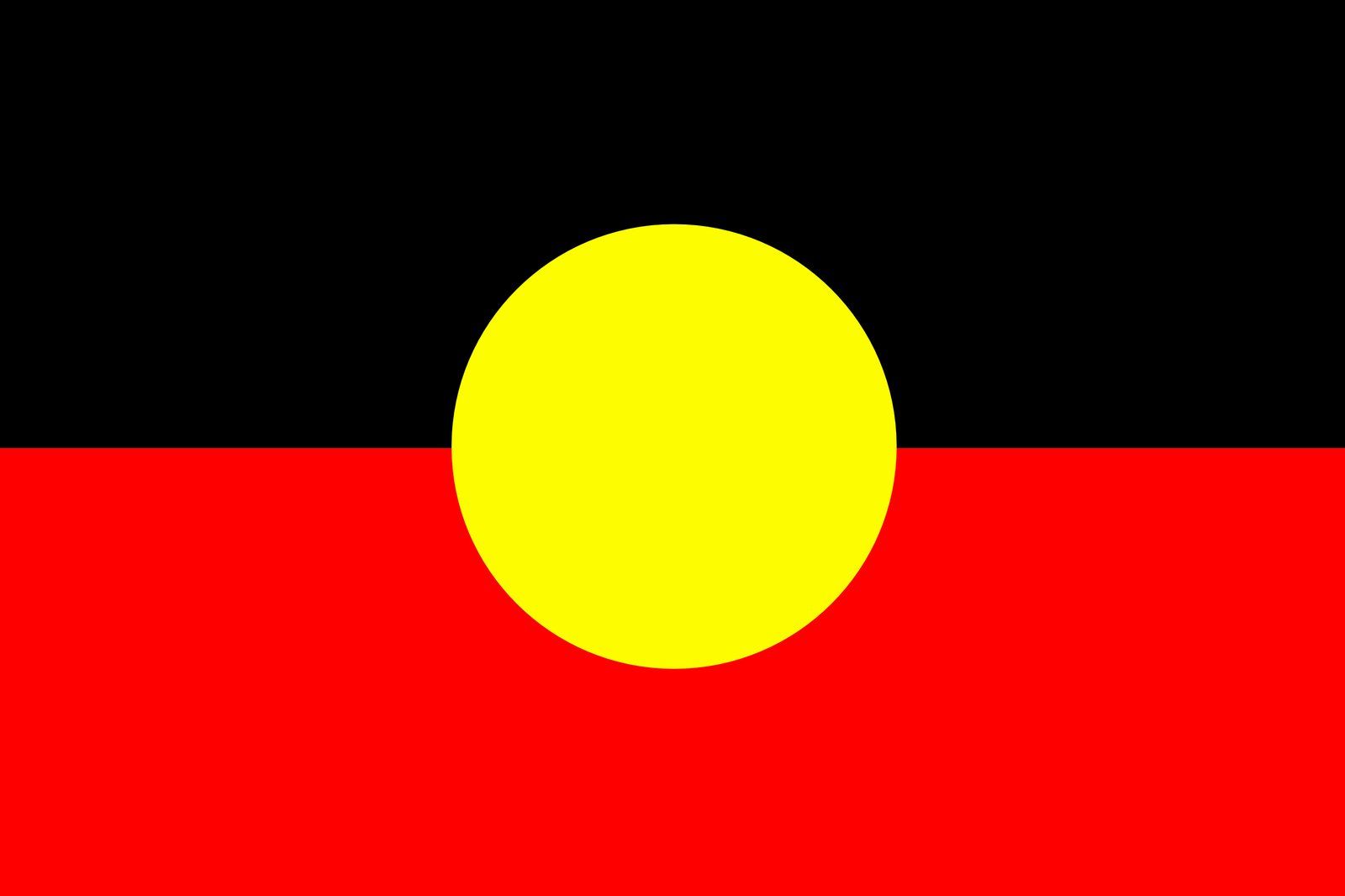 Australian Aboriginal Flag: Black top, red bottom, yellow center circle.