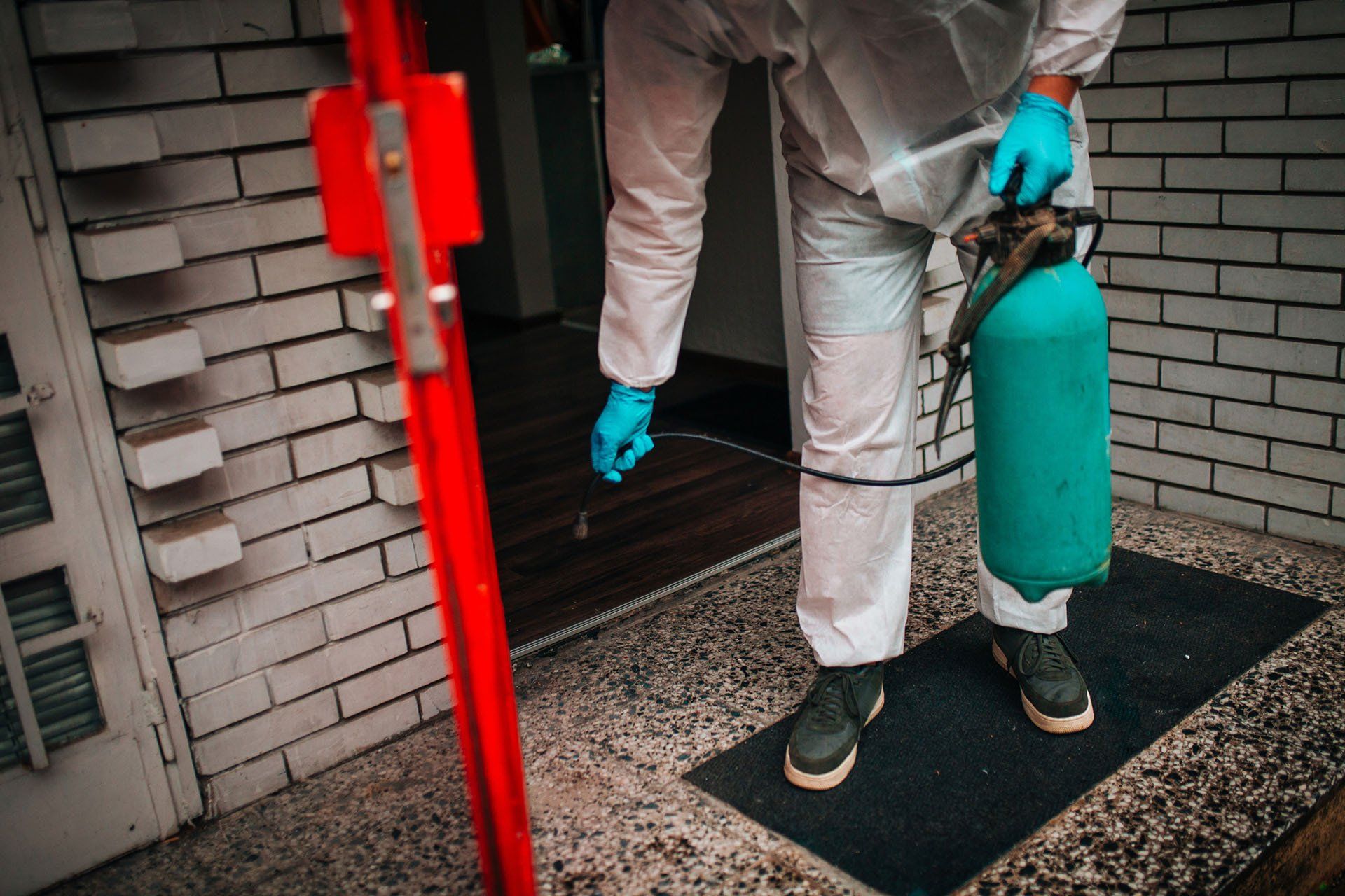Spraying Insecticide — Columbus, IN — YES Pest Pros