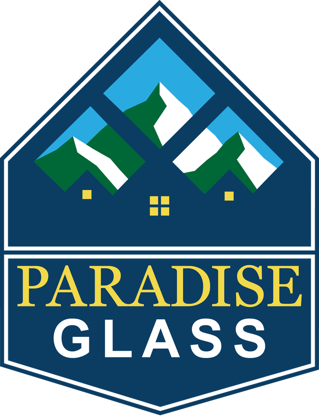 Logo for Paradise CB Glass: a blue and white badge with mountain scene above company name.