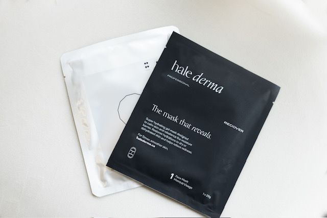 A black and white sheet mask with the word derma on it