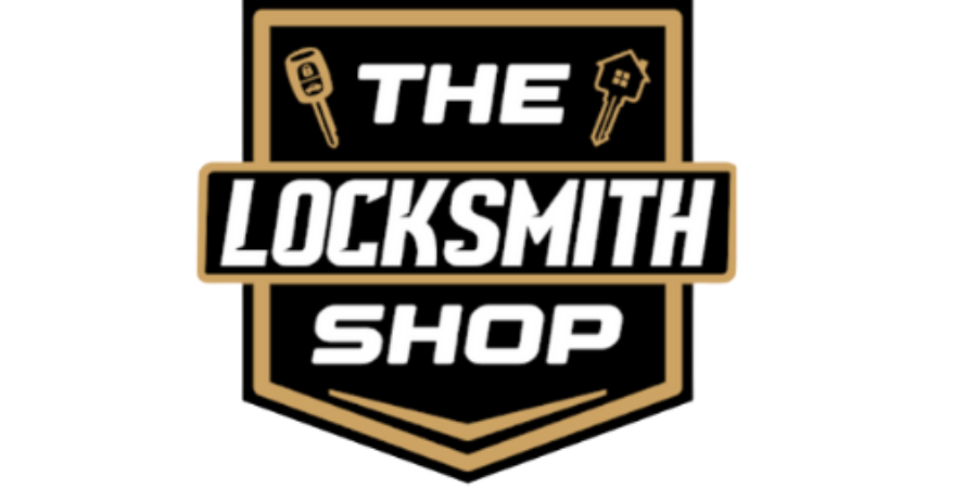 Logo for The Locksmith Shop: text inside a shield shape with key icons.