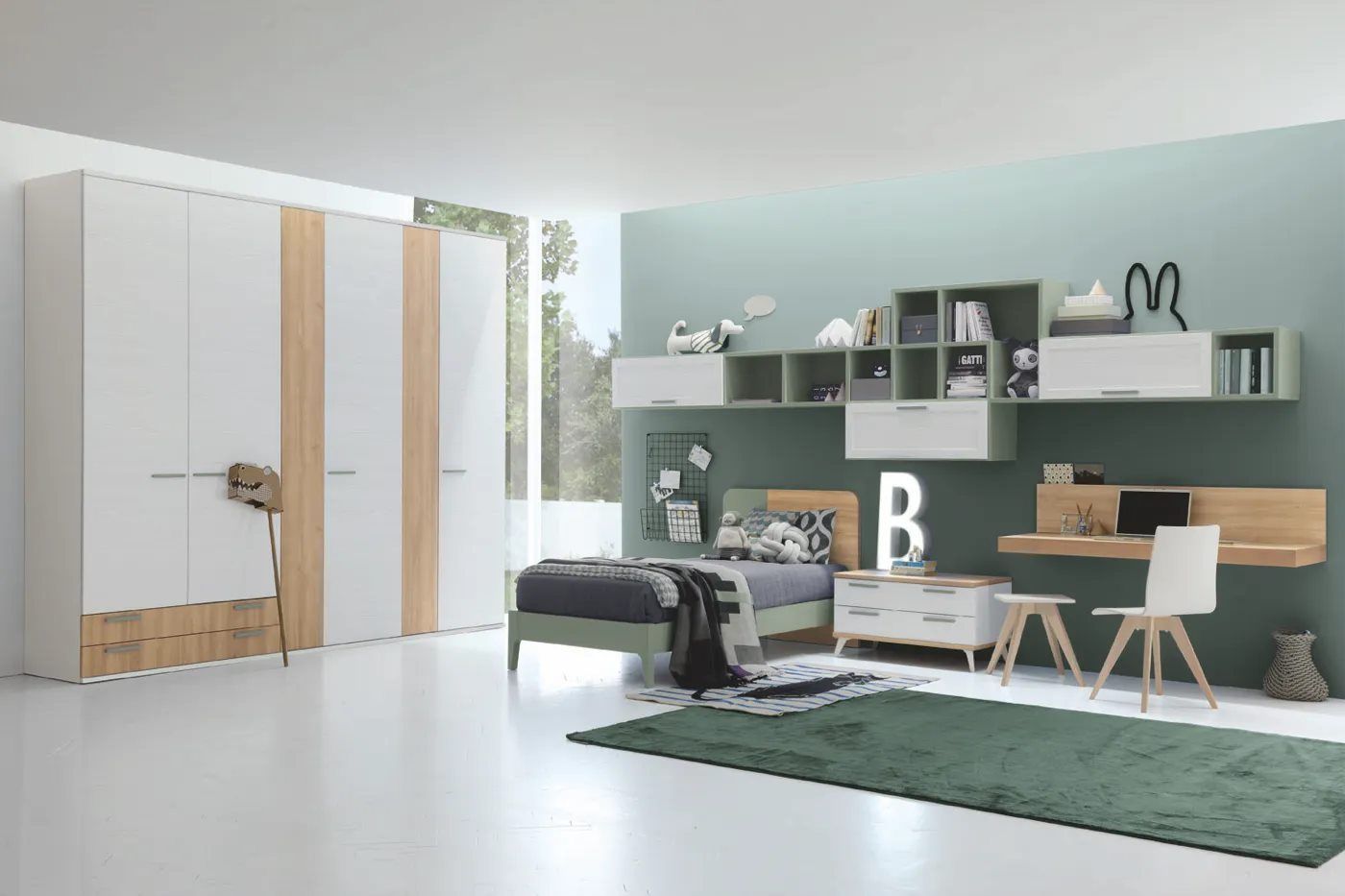 Camera da letto moderna con mobili bianchi e in legno, dettagli verdi.