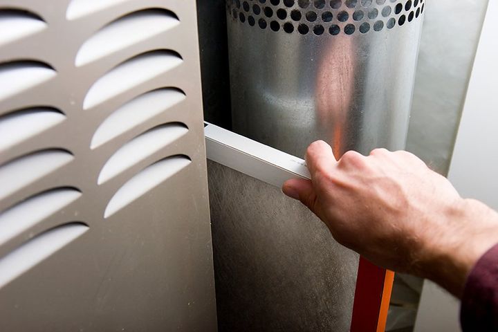 Changing furnace filter for efficiency