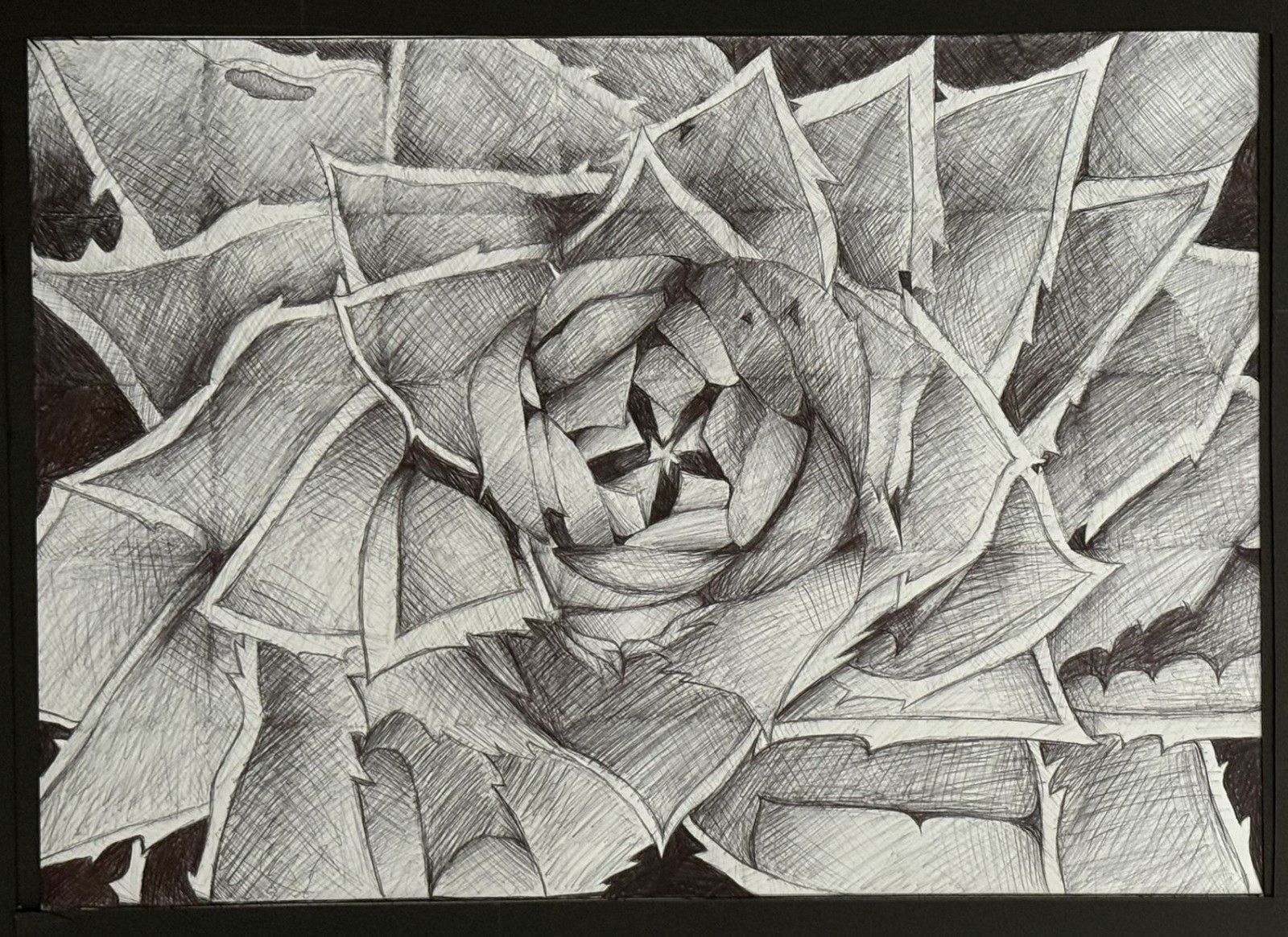A black and white drawing of a flower with a star in the center