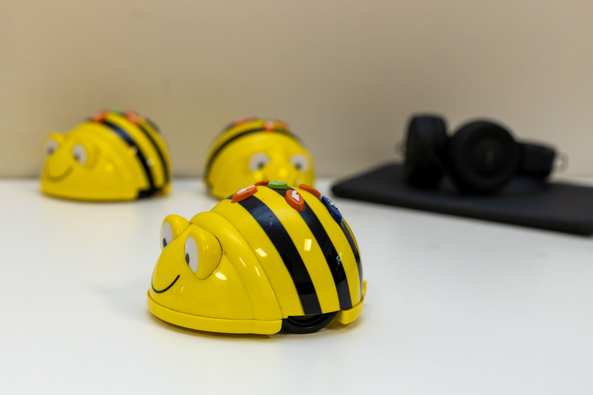 a person is using a tablet with a green cord attached to it