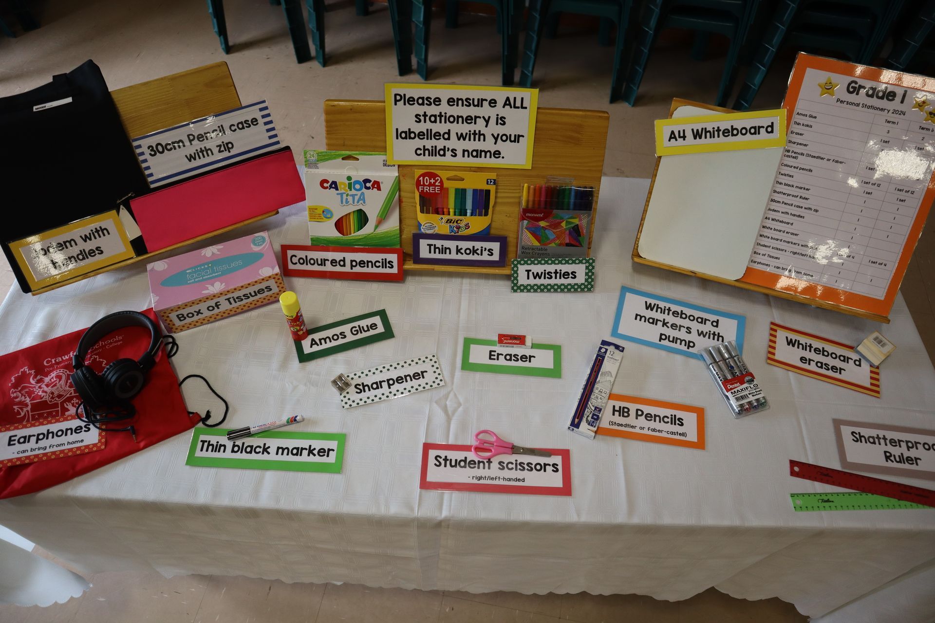 A table with a bunch of items on it including headphones