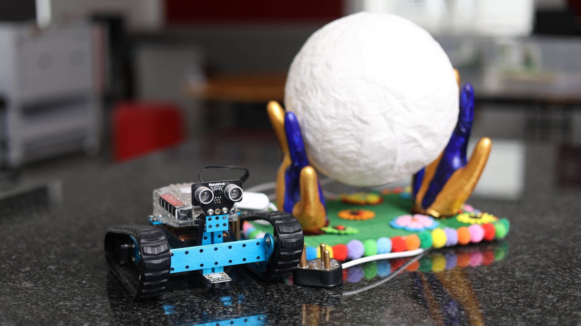 robot on a table .