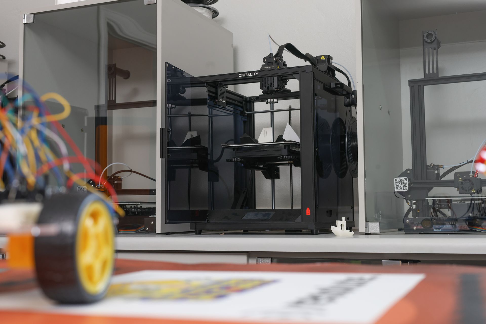 a machine is cutting a yellow object