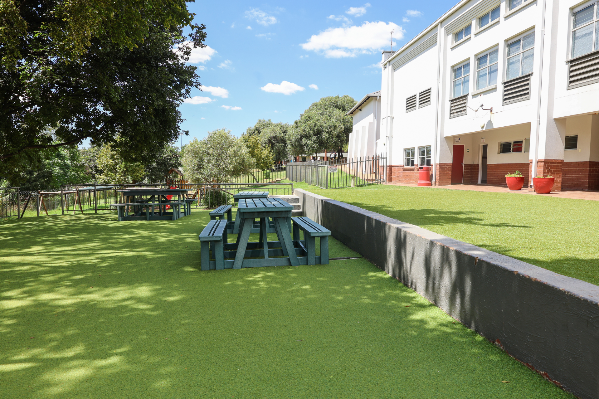 a hallway with a mosaic on the wall