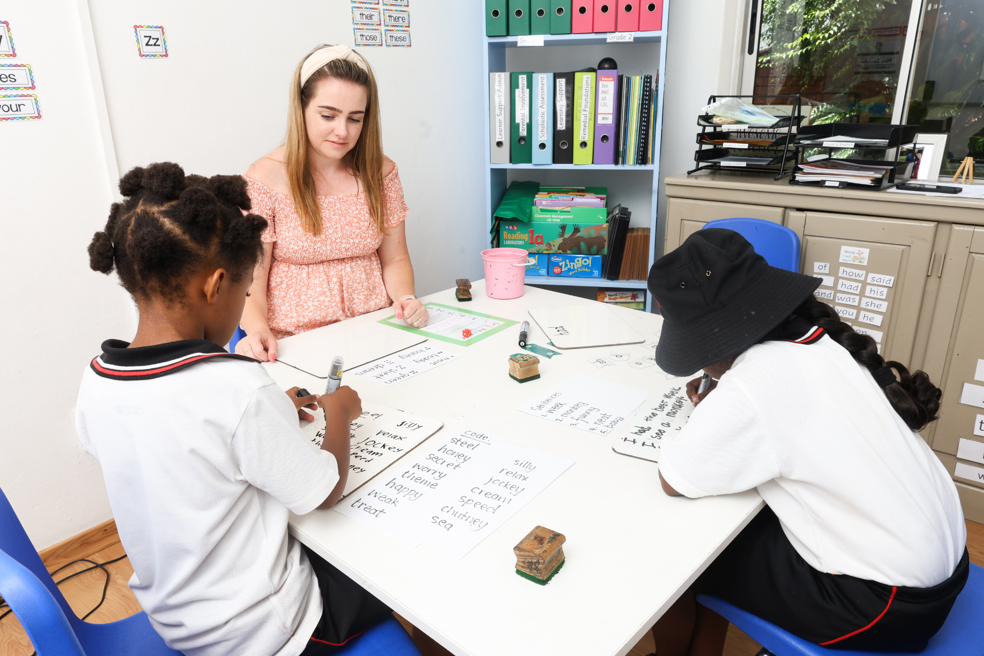 a large brick building with stairs leading up to it
