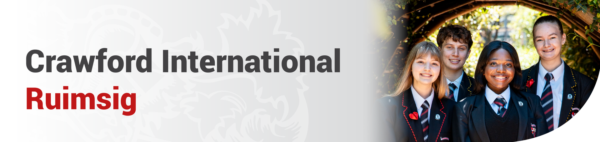 A man wearing glasses is standing in front of a crawford international rumsig banner.