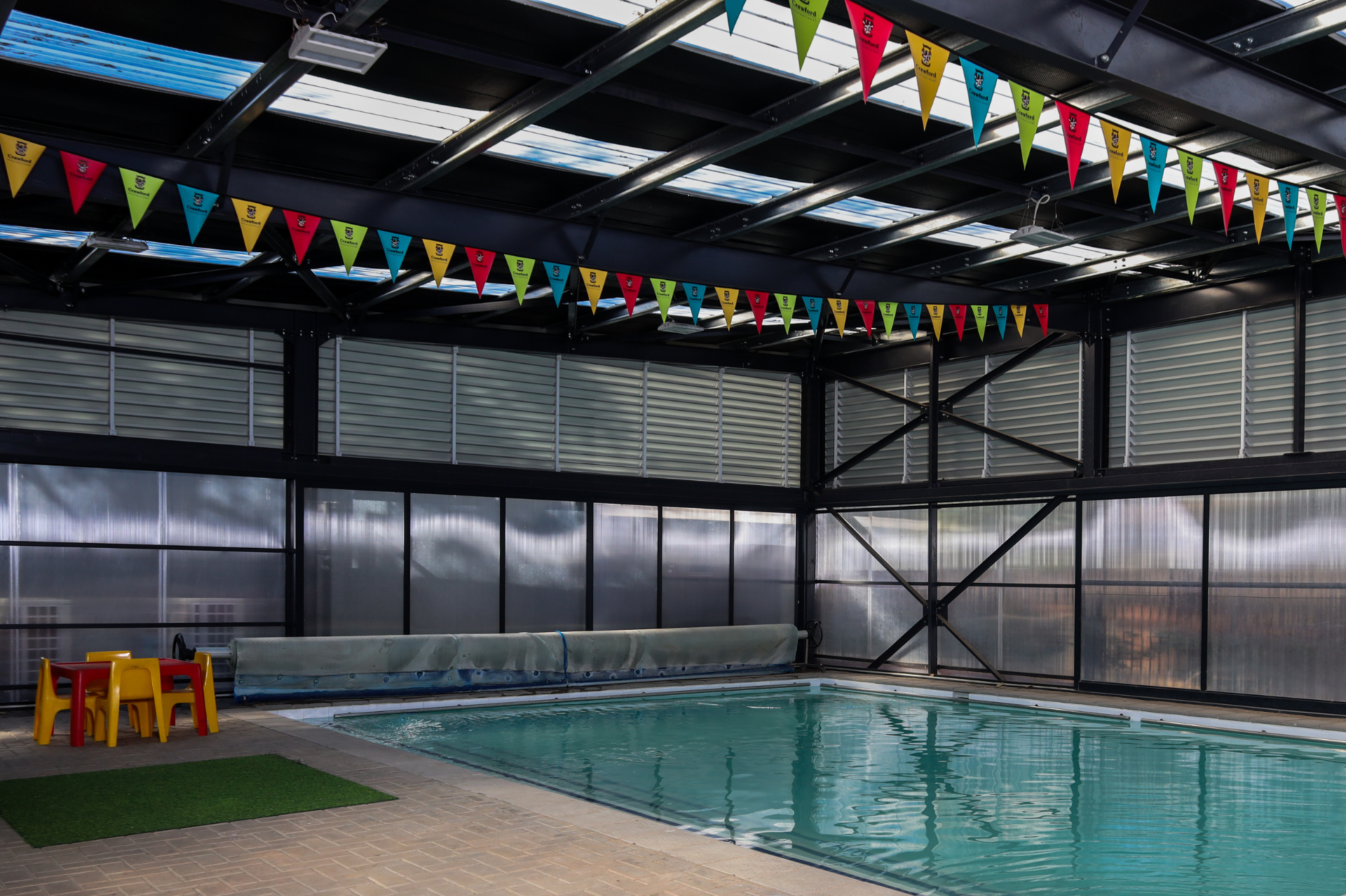 there is a tree house in the middle of the room .