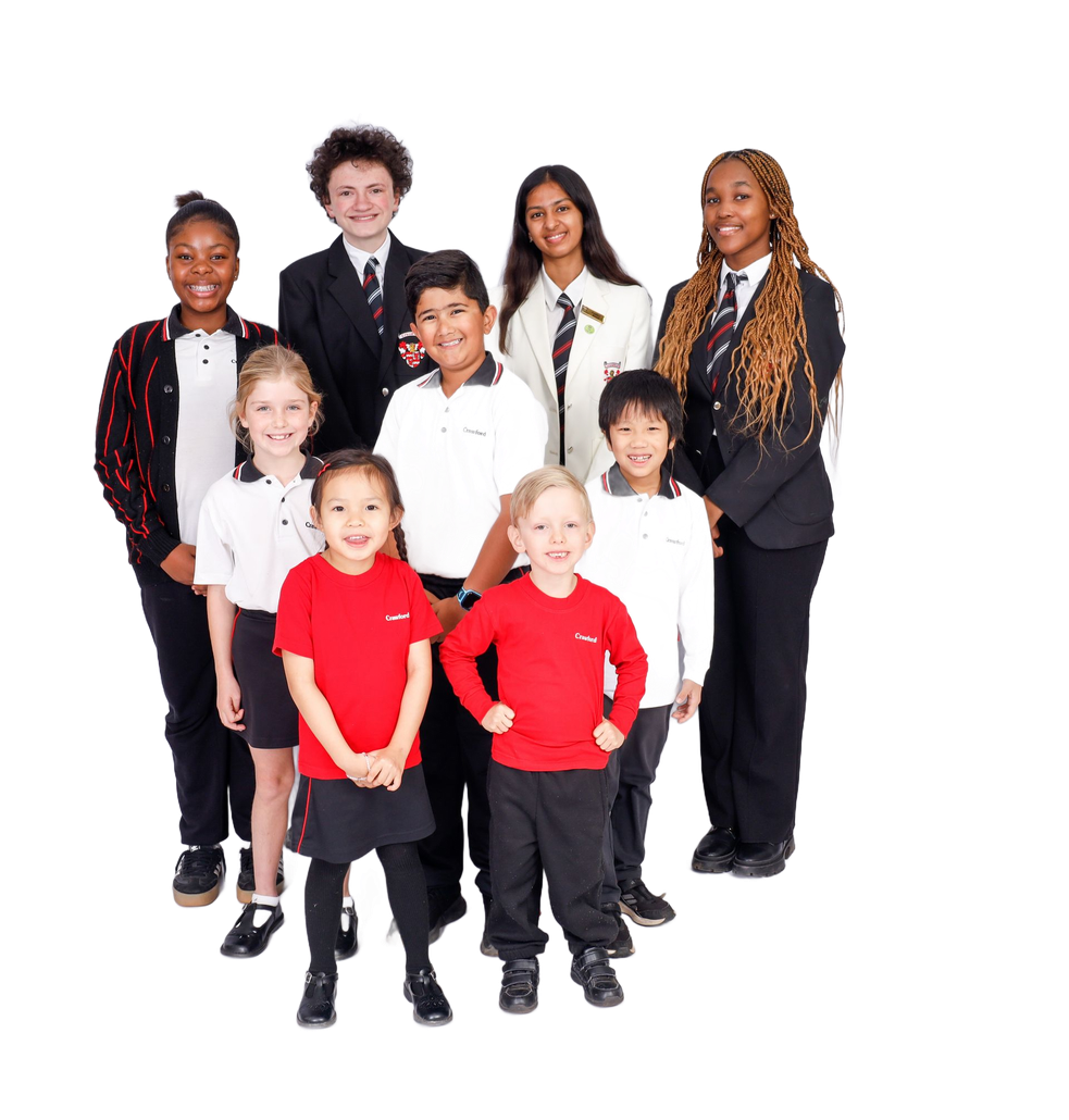 Group of students in school uniforms, diverse ages and ethnicities, smiling.
