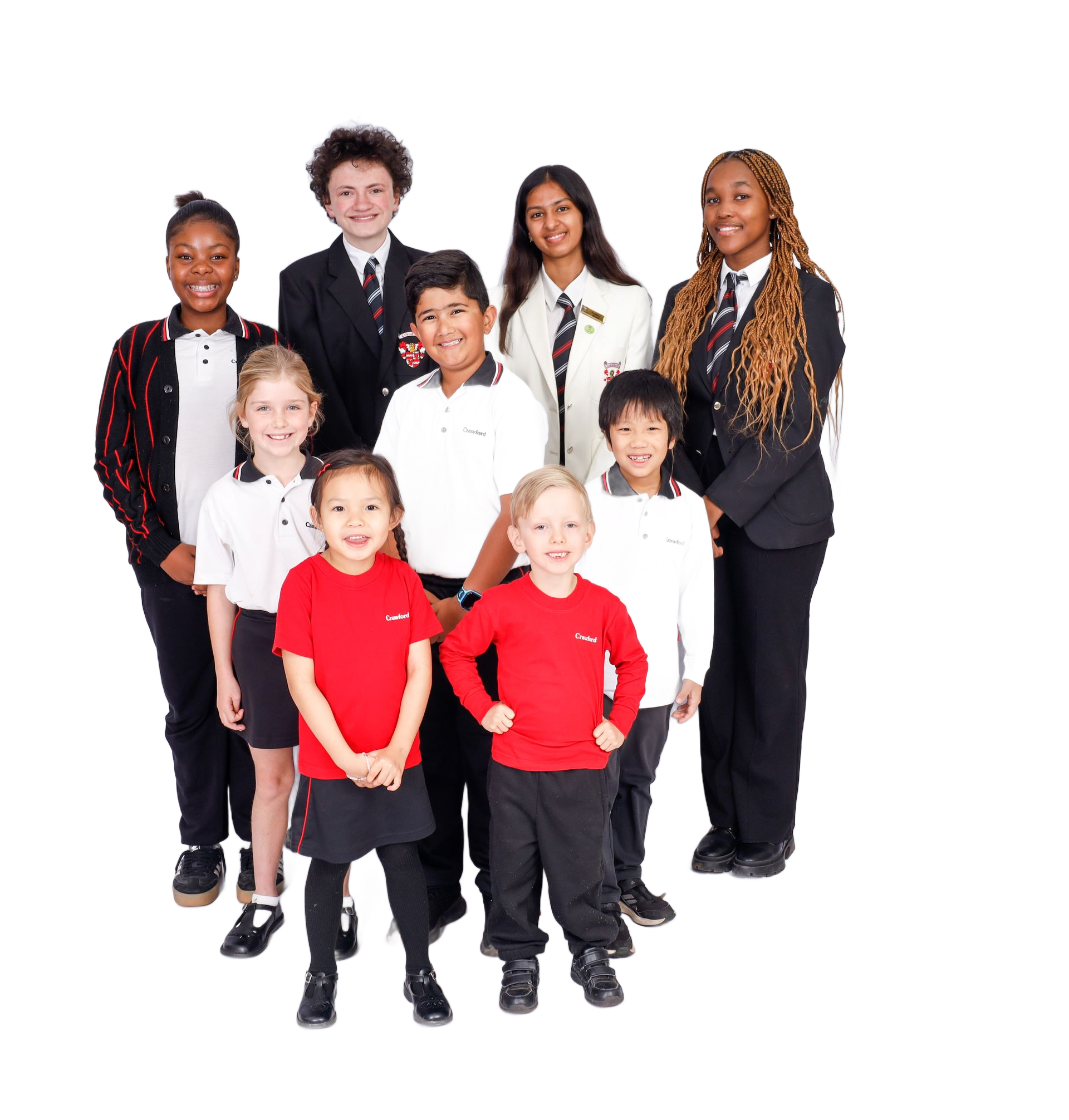 Group of students in school uniforms, diverse ages and ethnicities, smiling.